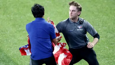 Fan waving American flag storms field in Game 6 of World Series, sparking boos from Canadian crowd