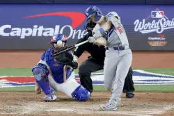 Dodgers historic postseason homers by Shohei Ohtani, Will Smith and Miguel Rojas fetch big bucks at auction