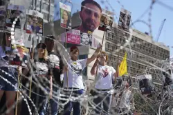 Israeli forces kill over 20 people seeking food in Gaza, witnesses and health officials say