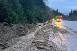 Storms bring heavy rain to the Pacific Northwest, snow and freezing rain to the Upper Midwest