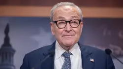 Bernie Sanders clashes with town hall attendee over Schumer leadership during shutdown