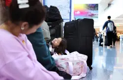 Travelers face canceled trips and long delays as air traffic cuts continue