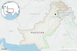 Suicide bombers strike security force headquarters in northwestern Pakistan, killing 3 officers