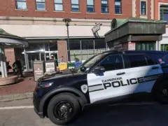 Driver shot at while parking car in Cambridge